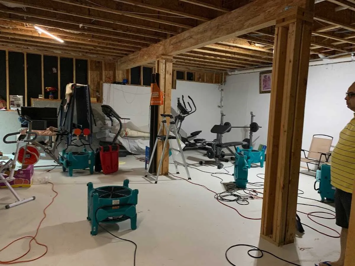 Basement drying equipment setup for Contents Cleaning & Restoration in Reedsburg